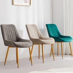 Armless and ergonomically contoured, it fits effortlessly under tables and into compact dining setups.