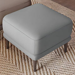 Tapered leg ottoman close-up, leather ottoman, footstool, faux leather, minimal design