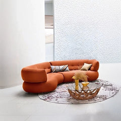 Crescent shape modern sofa photo + corner settee + lux sofa + terracotta orange