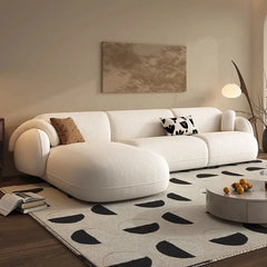 Rounded arm silhouette and seamless upholstery, design sofa design, 2+Lounger couch, cream fabric