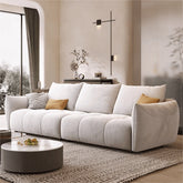 Soft ivory sofa with plush curves + modern sofa design + l shape couch