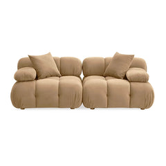 Beige sofa with cushions on a white background