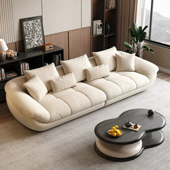 Cloud-like couch form with soft upholstery and contemporary sofa design