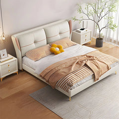Side angle picture of bed frame with gold legs and cot design feel