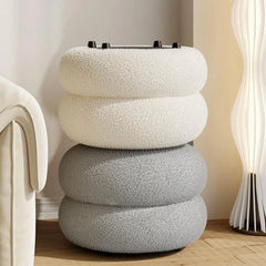 The Bask pouffe ottoman is a thoughtfully sculpted seating solution that embodies Scandinavian charm and modern softness.