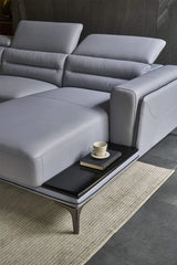 Broad low-profile arms with stylish sofa design, l shape couch in slate grey