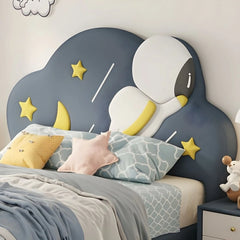 Rounded edges and padded fabric frame in navy, children’s bed with mattress, kids furniture