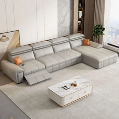 Gray sectional sofa in a modern living room with a coffee table.