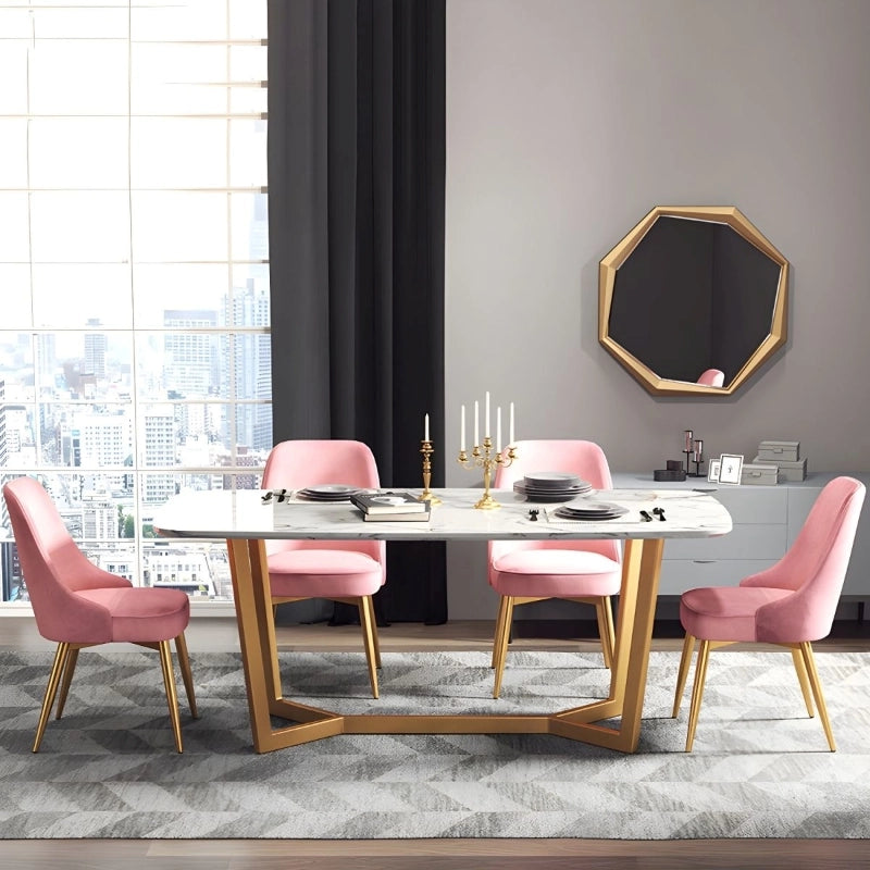 The Larissa dining chair blends velvet sophistication with ergonomic support, making it a practical addition to modern homes
