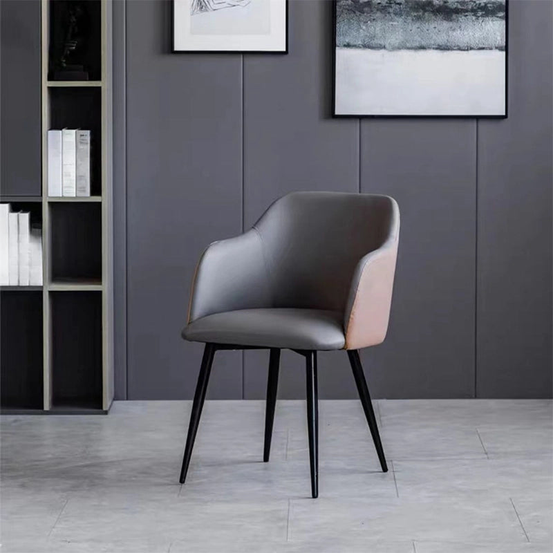 The powder-coated tapered metal legs enhance both stability and style.