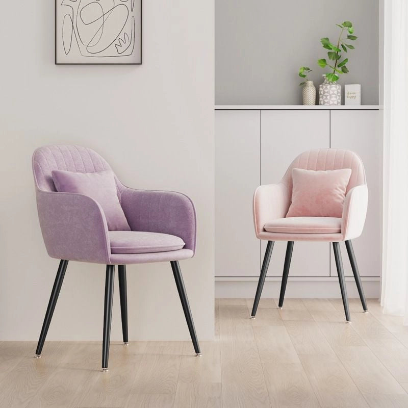 Crafted for compact luxury living, this upholstered velvet armchair enhances modern Indian dining spaces with a balance of comfort and chic appeal