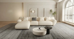 Cream beige L shape sofa design with soft curves and premium fabric sofa set