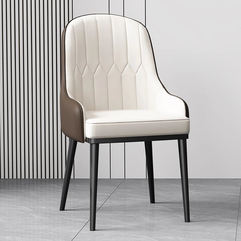 Add a splash of modern elegance to your home or commercial space with this set of dining chairs, featuring bold chair designs in vibrant dual-tone faux leather upholstery.