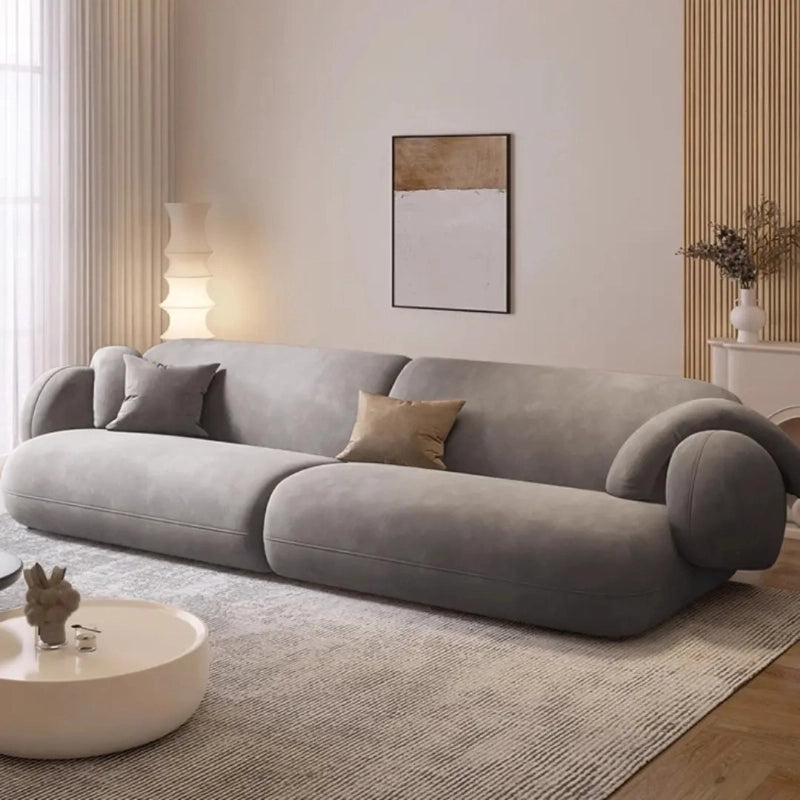 Corner setup with voluminous shape, set sofa design, corner couch, neutral palette

