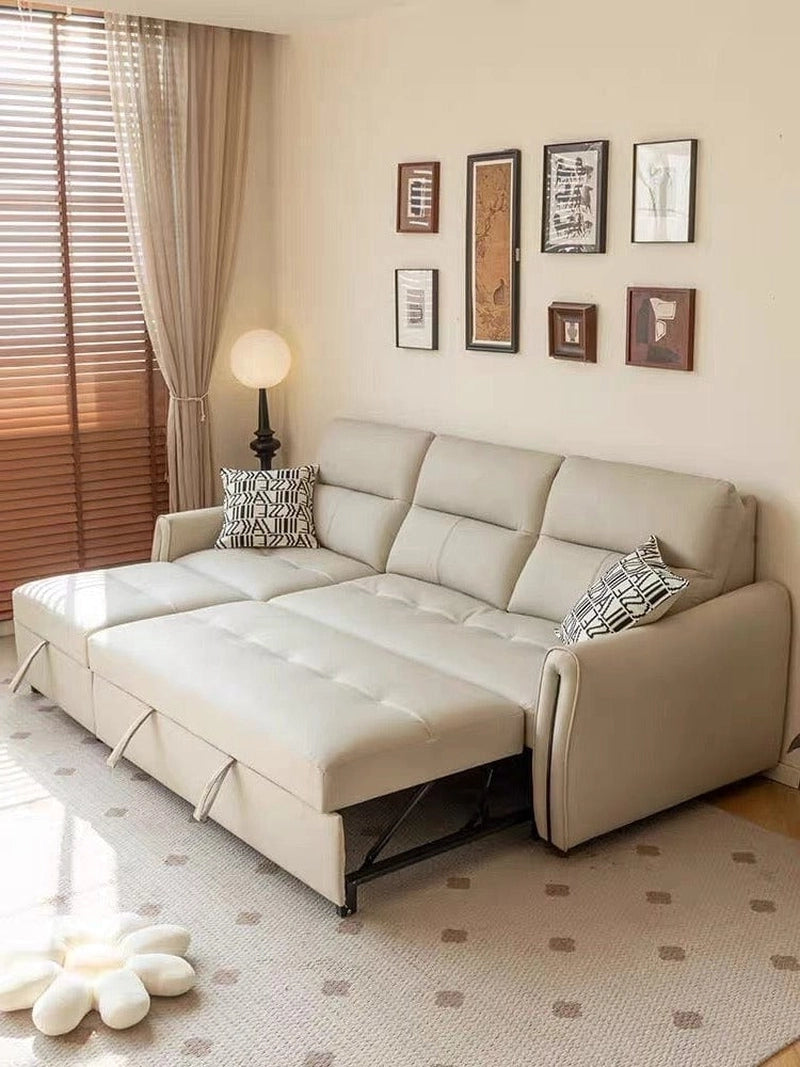 Its neutral beige and grey tones, faux leather finish, and plush segmented cushioning enhance both visual appeal and seating comfort.