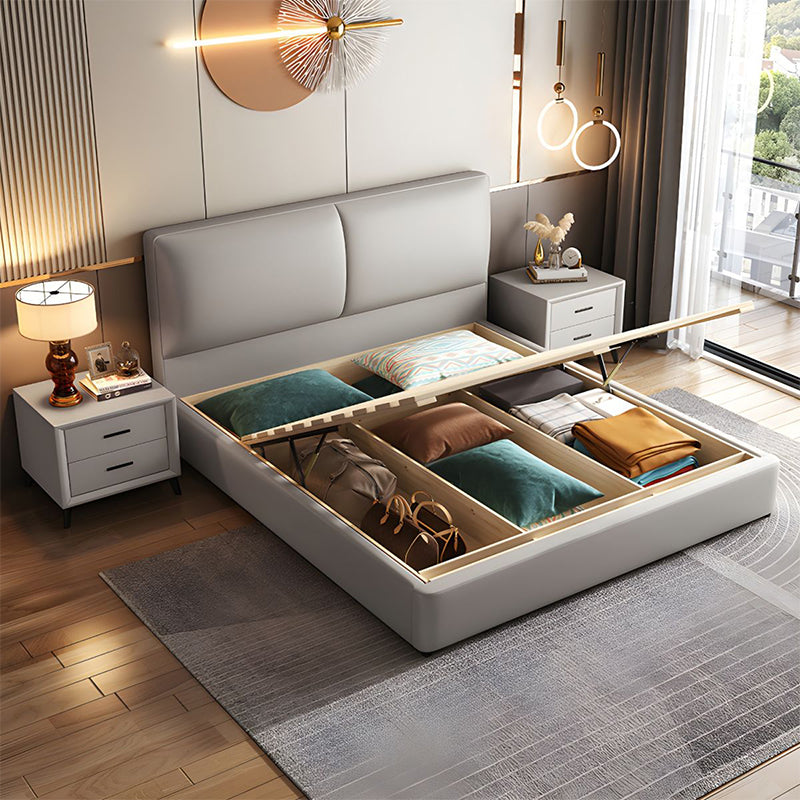 Upholstered in a soft neutral tone, its cushioned twin-panel headboard and sleek black legs make it ideal for a master bedroom bed design.