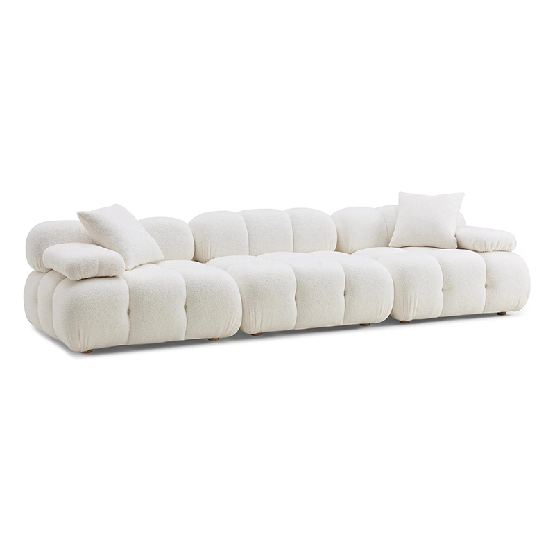 The deep tufted velvet upholstery adds richness while rounded bolsters and soft edges promote relaxed lounging.