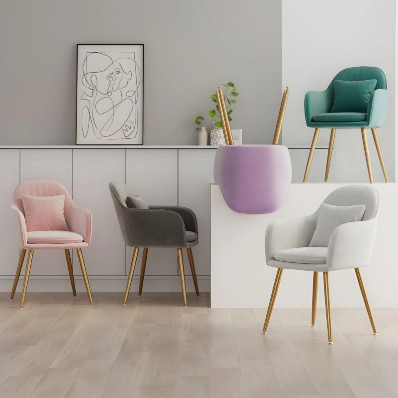 Available with pastel-hued velvet and metal legs in gold or black finish, this chair serves beautifully as a set of dining chairs or part of a dining chairs set of 6