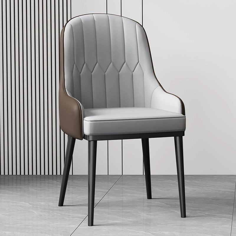 Perfect as dining room chairs or for restaurant furniture tables and chairs, each dining chair is built with a contoured parsons back, waterfall seat, and sturdy black tapered legs—some enhanced with gold-tipped ends