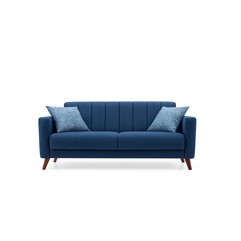 Blue sofa with two patterned cushions on a white background