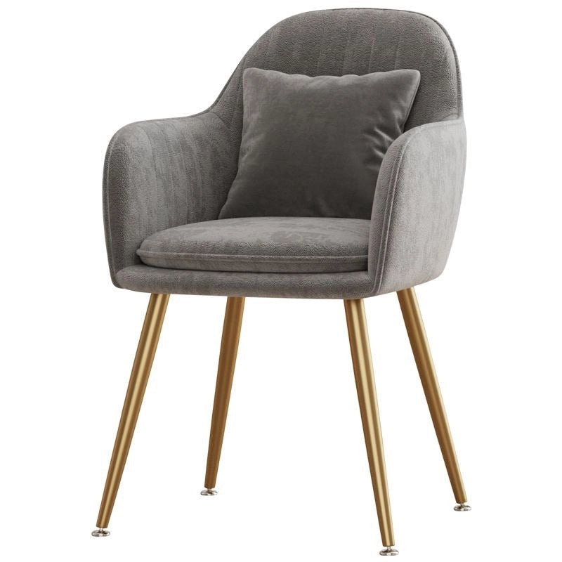 Elevate your dining or vanity setup with this modern velvet dining chair, featuring a curved channel-tufted back, thick cushion seat, and plush accent pillow for superior comfort.