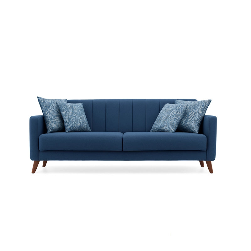 Blue sofa with patterned cushions on a white background