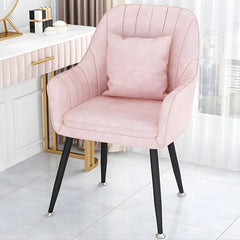 The Bliss dining chair balances elegance and practicality with its cocoon-inspired barrel shape, upright lumbar support, and tactile Nova fabric upholstery.