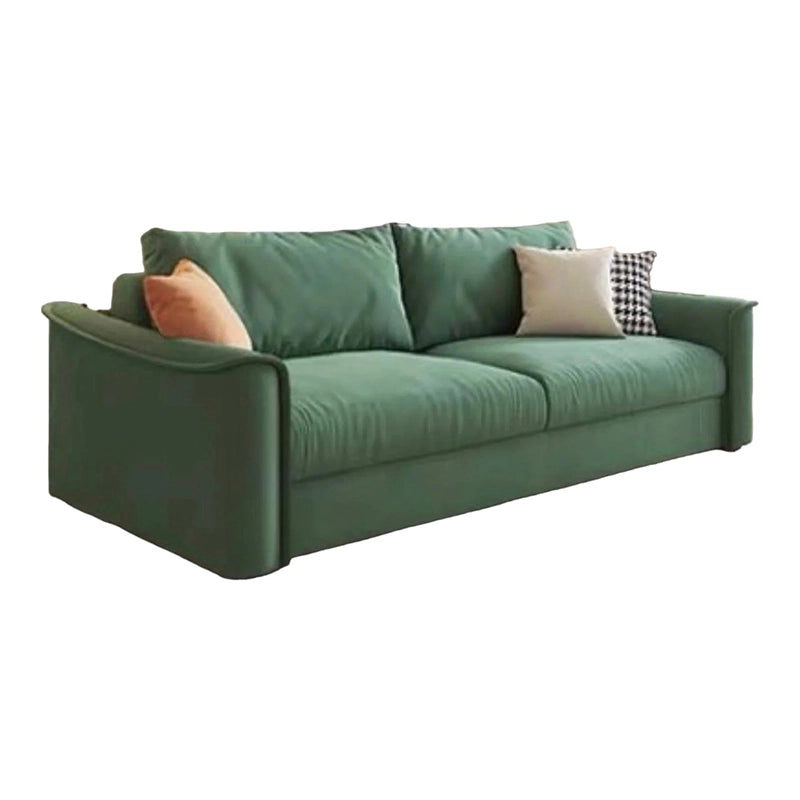 Sage green model in side view – convertible couch bed, sofa bed design, soft-touch upholstery
