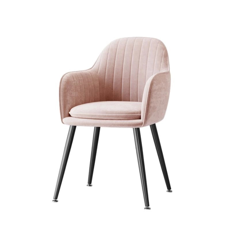 Supported by tapered metal legs in gold or black finish, this elegant armchair for dining table adds a pop of colour and glamour to any interior.