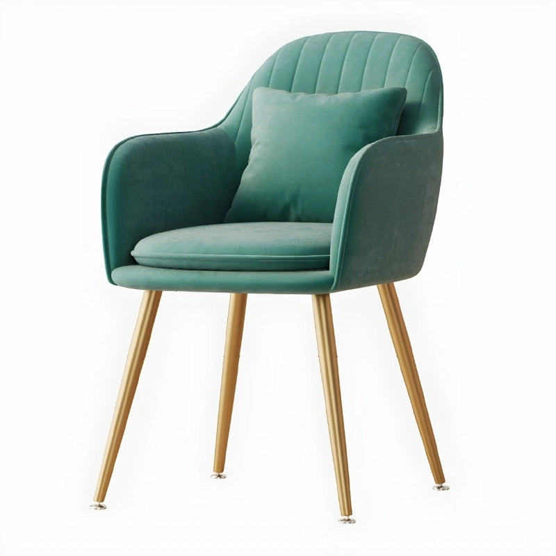 Frost dining chair blends modern armchair style with velvet elegance - Teal