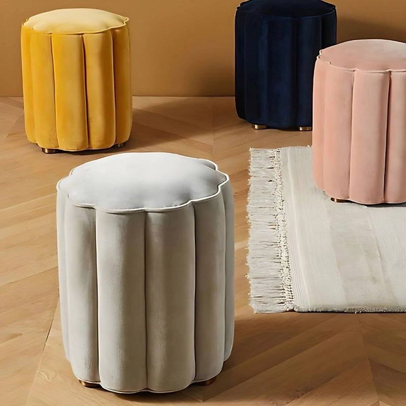 The lightweight form makes it easy to move, functioning well as a pouf seat, footrest, or compact ottoman for urban homes. Its floral-inspired shape fits perfectly in apartment lounges or near a modern coffee table.