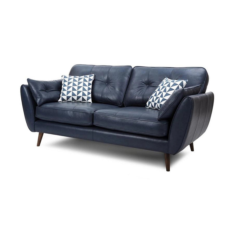 Upholstered in either soft-touch fabric or pure leather, it features button tufted backs, gently flared arms, and a structured cushion profile ideal for extended seating.
