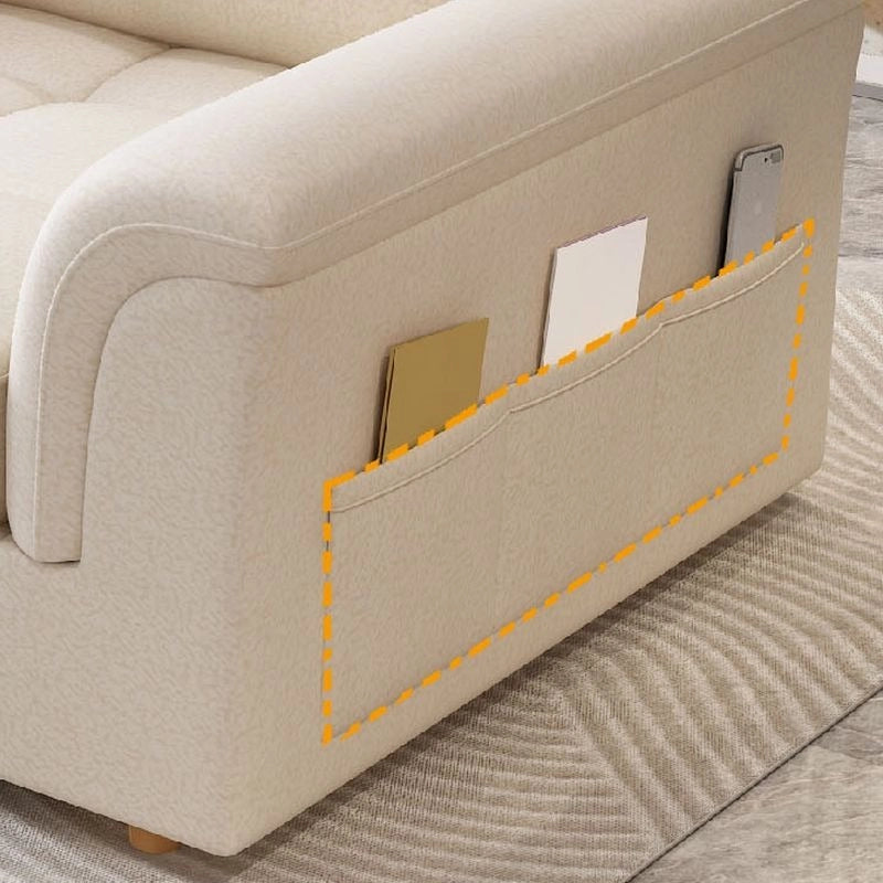 Built-in arm pockets on cream L-shaped convertible couch bed sleeper sofa