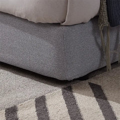 Upholstered headboard with thick padding in bed frame and modern style bed design