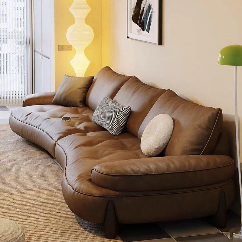 Upholstered in rich mocha and taupe hues, this leather settee comes in 1, 2, 3, and 4 seater variants.