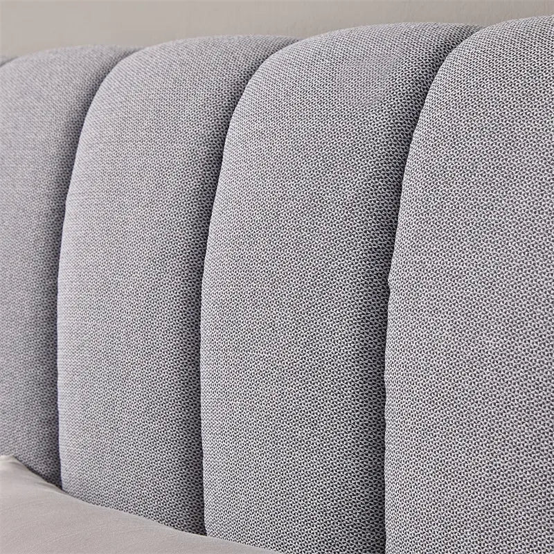 Side angle of Hale modern bed design showing minimal profile and grey bed frame