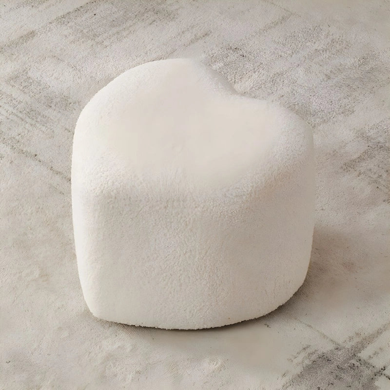 White pouffe ottoman close-up, footrest + pouffe stool, soft knit texture, low-seating height