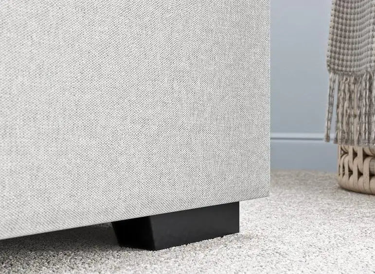 The Marisma hydraulic upholstered bed balances modern bed design with functionality.