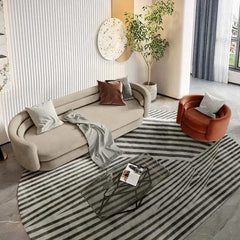 This contemporary lounge set includes a 3 seater sofa and a 1 seater couch, unified by an elliptical plan shape and seamless design.