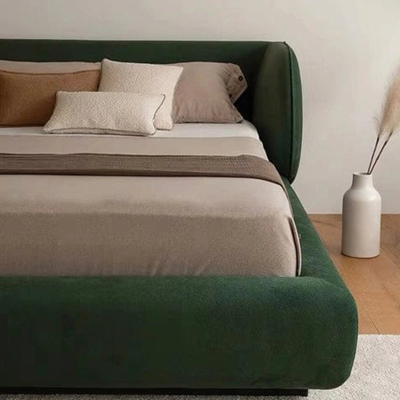 Rounded silhouette cot design photo in green tone showing modern bed and cot feel