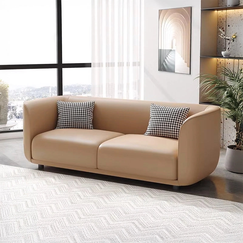 This contemporary 3-seater couch offers a harmonious mix of function and elegance.