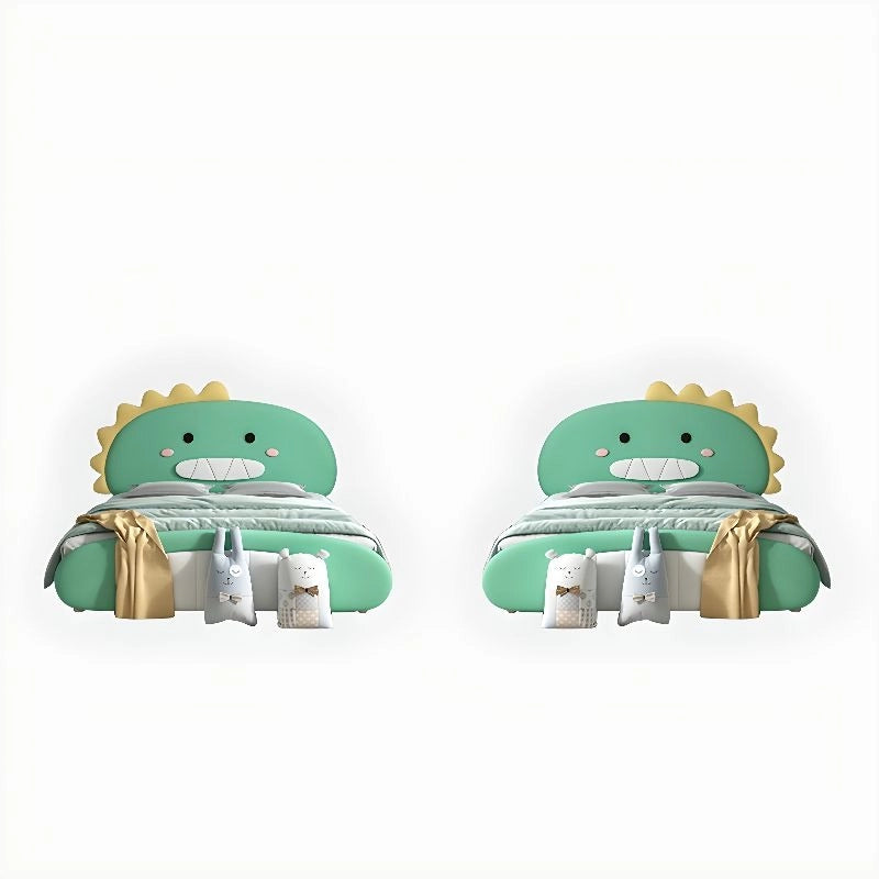 Featuring a padded headboard styled like a cheerful dinosaur face, this playful children’s bed blends soft mint tones with white and yellow details.