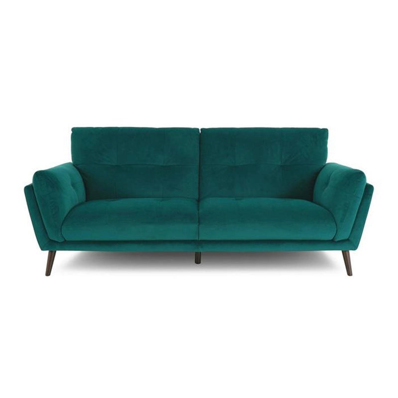 The deep tufted cushions and angular armrests provide both support and structure. 