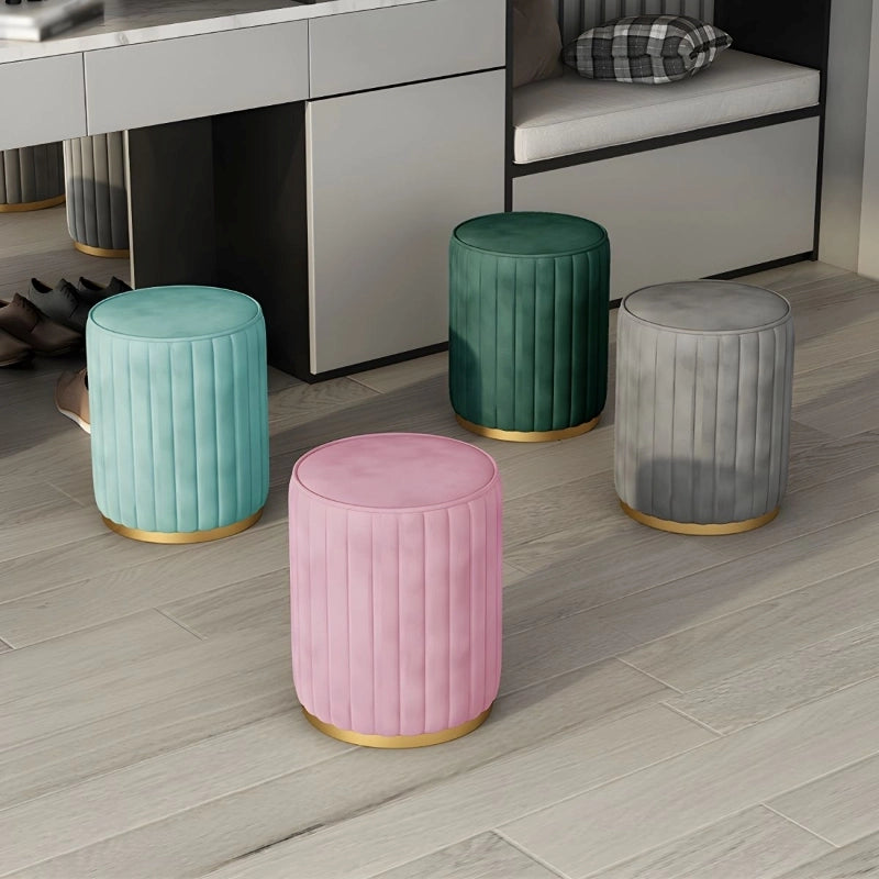Built with neem wood and 32-density foam, it features a flat, cushioned top upholstered in velvet, supported by a gold-finish base