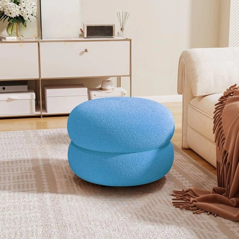 Blue pouffe photograph ottomans and benches and footstools and ottomans, stacked seating.