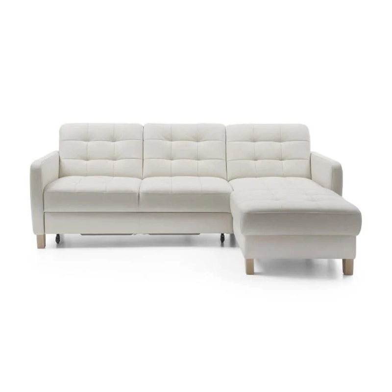 Its structured tufted upholstery in soft off-white fabric is complemented by light wooden legs, offering visual airiness.