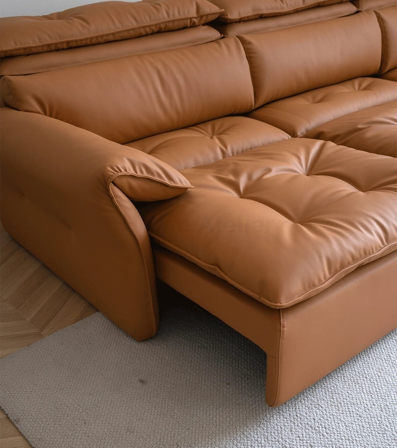  Designed as a three-seater with a rectangular silhouette, it transforms effortlessly into a queen-size sleeper using a manual pull-out system.