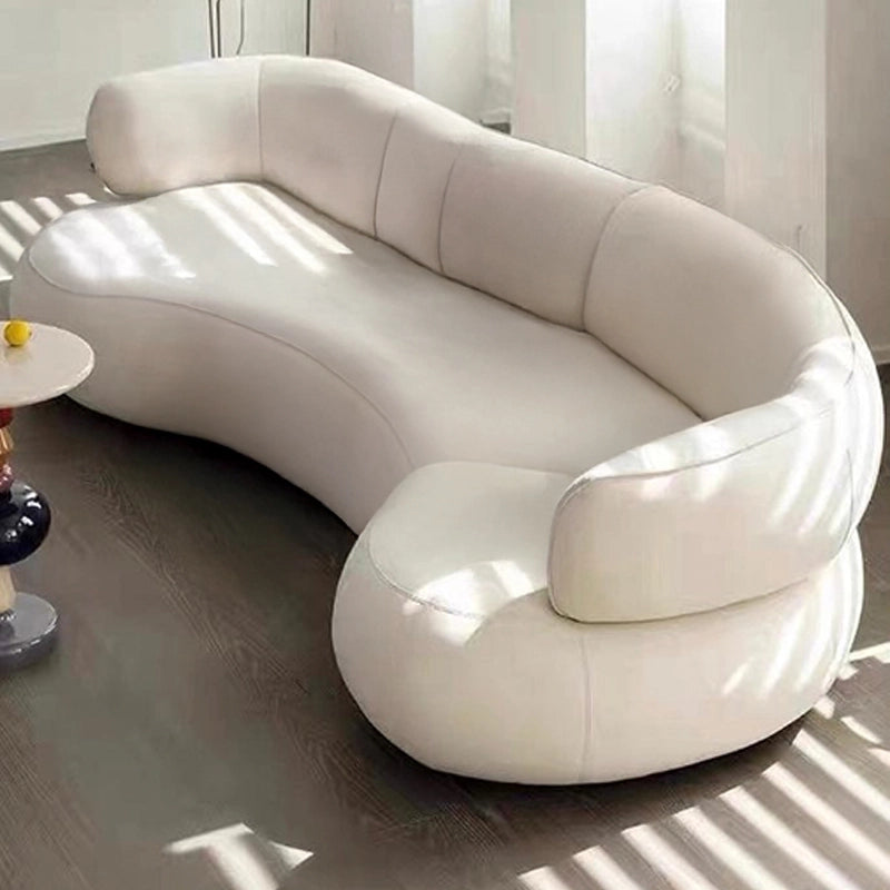 Upholstered in either richly textured terracotta fabric or smooth off-white suede, it serves as an eye-catching centrepiece in any upscale living room or studio lounge.