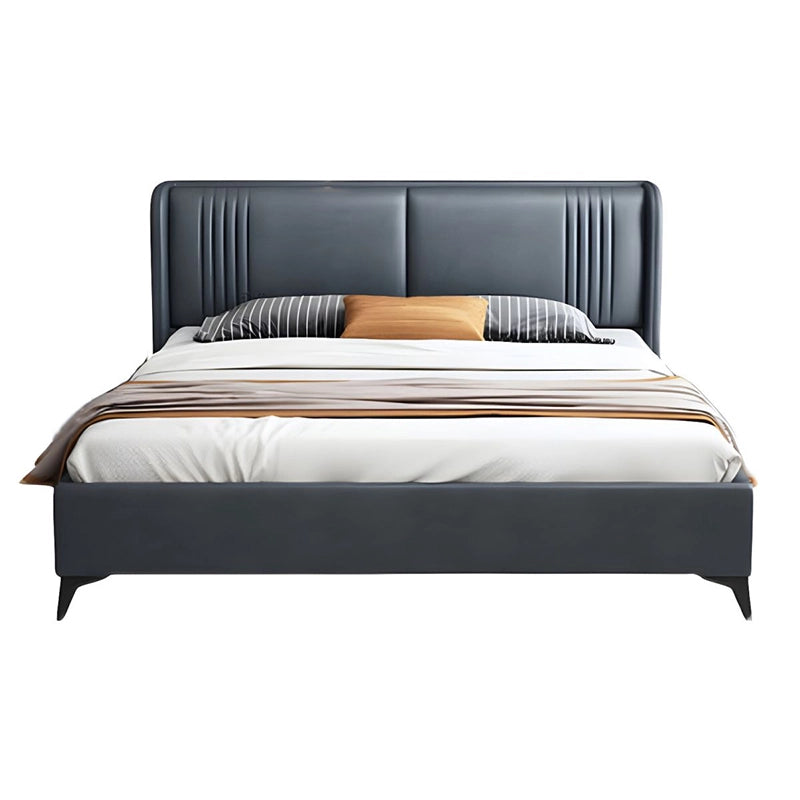 Upholstered in smooth matte navy faux leather, the bed features a sculpted headboard with vertical stitched accents and red ambient LED lighting, enhancing its futuristic vibe. 
