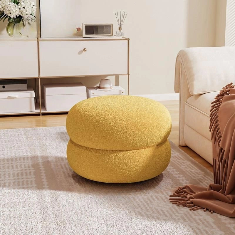Mustard boucle pouffe image pouffe stool and footrest, pillowy cushion on low ottoman.